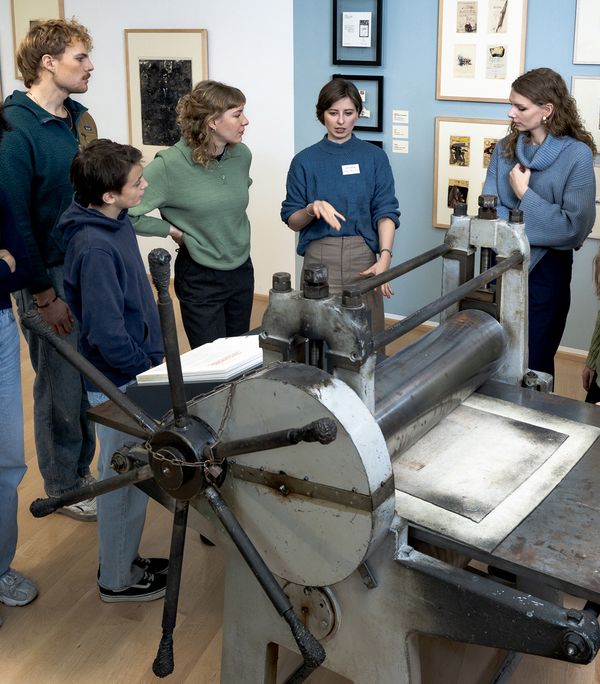Visitors on a guided tour of the printing press. Photo: Studio 3x3