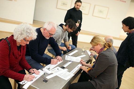 Visitors try out a rhythm machine at the exhibition "Sound goes Image". Picture: Markus Hibbeler